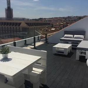 A Terrace On A Topfloor With A View Lisbon